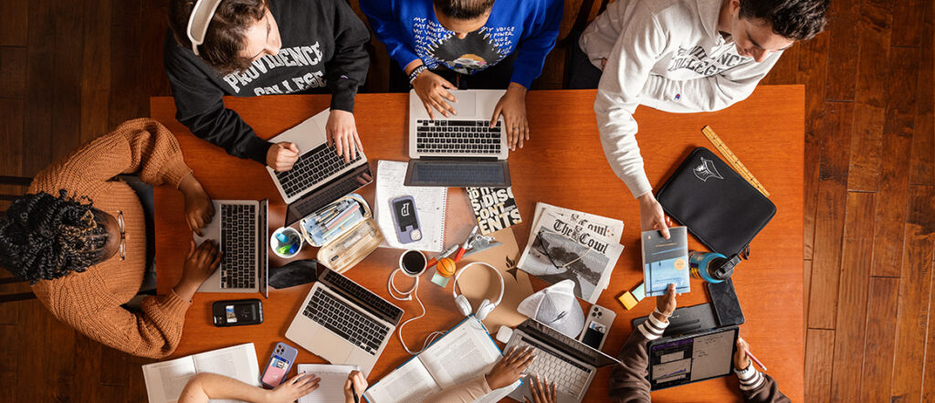 studying, table, overhead table shot, books, laptops, friars apparel
